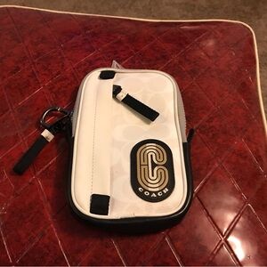 North/South Hybrid Pouch In Colorblock Signature Canvas With Coach Patch